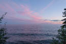 Gorgeous pink sunset photographed by Linda over Lake Superior.